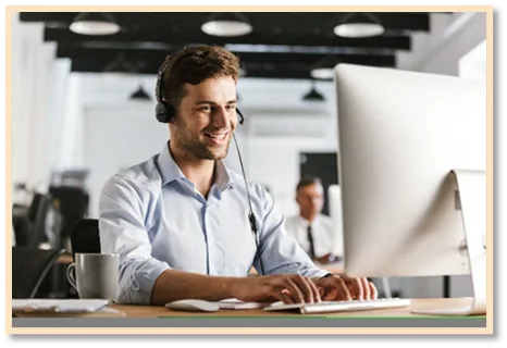 A smiling virtual assistant fulfills medical billing tasks for an outsourcing hospital, ensuring that he meets the medical institution’s specified virtual assistant KPI.