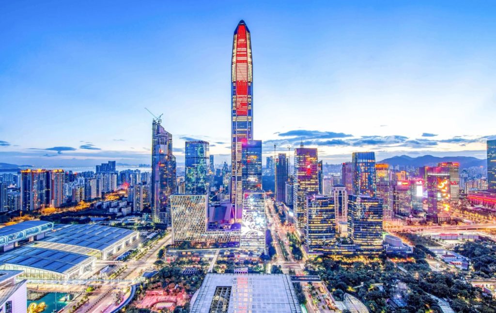 A picture of Shanghai, China is being displayed, demonstrating the business sector's grand success and contribution to the Chinese economy.