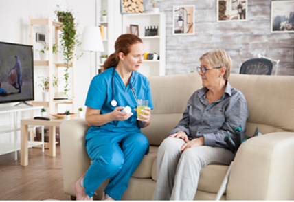 A recruited travel nurse from a medical staffing agency, as a result of healthcare staffing solutions, visits an elderly woman to check her health.